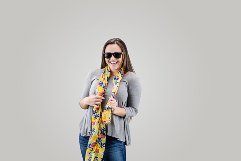 young woman with scarf and sunglasses